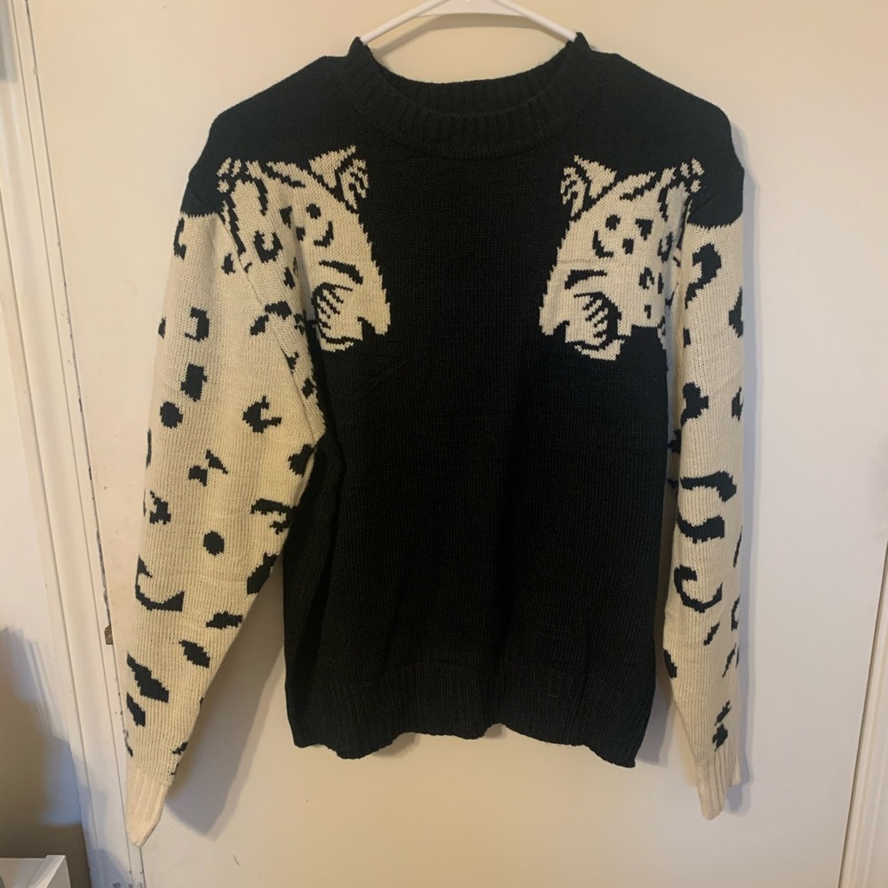 Animal print sleeved black sweater